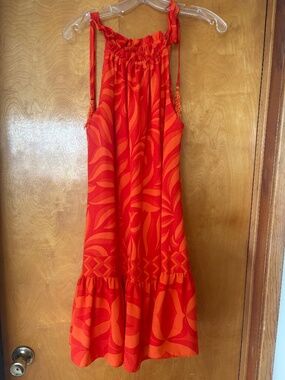 Sleeveless, orange Taylor dress